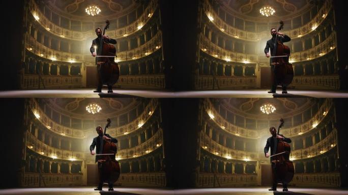 男性大提琴家的电影镜头正在经典的剧院舞台上独奏大提琴，并带有戏剧性的灯光
