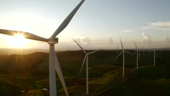 日落时鸟瞰图可再生能源风力涡轮机农场