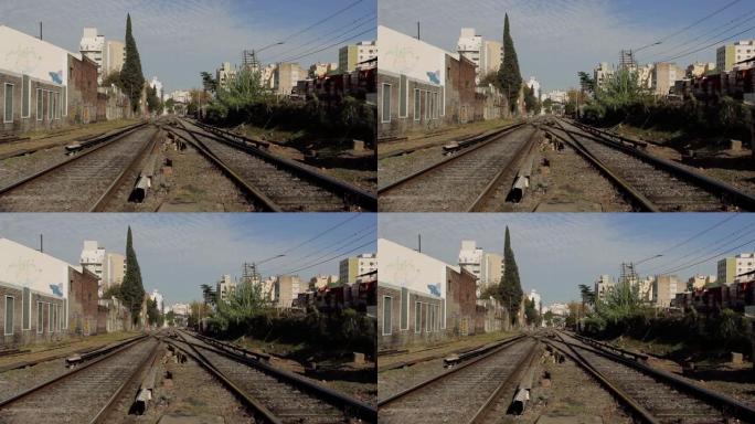 阿根廷布宜诺斯艾利斯caballi至邻里的建筑物之间的旧火车轨道。