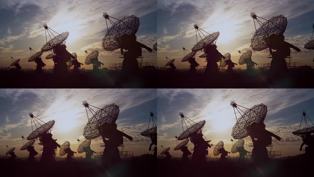 日落时分，射电望远镜瞄准天空的景观