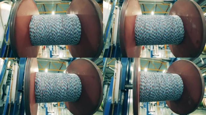工厂里巨大的电线纺丝线轴