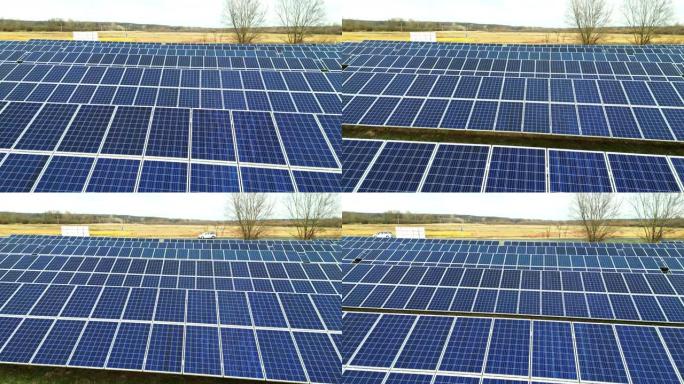 在农村太阳能农场成排的平移无人机视角太阳能电池板
