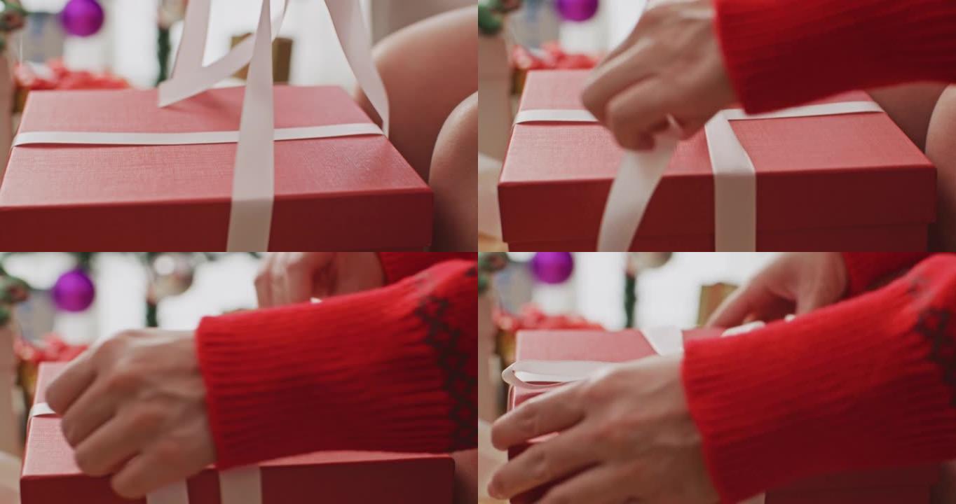 女人在家包装圣诞礼物