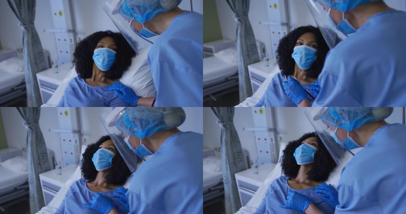 不同的女医生和病人在心脏检查时戴口罩