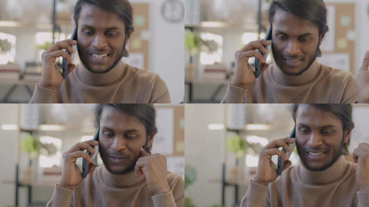 印度上班族在手机上聊天，笑着讨论生意的肖像