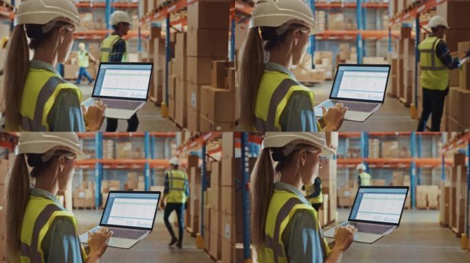 戴着安全帽的专业女工在摆满货架的零售仓库里拿着笔记本电脑，屏幕显示库存检查软件。肩侧视图