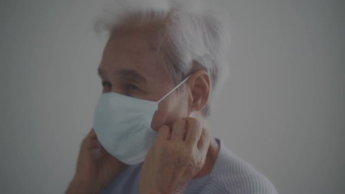 90岁以上，戴口罩的老年人保护病毒冠状病毒