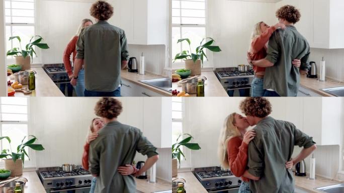 情侣，在厨房里跳舞和亲吻，爱与关怀，亲密的关系和有趣的在家一起跳舞。感情，与浪漫联系并快乐，放松并度