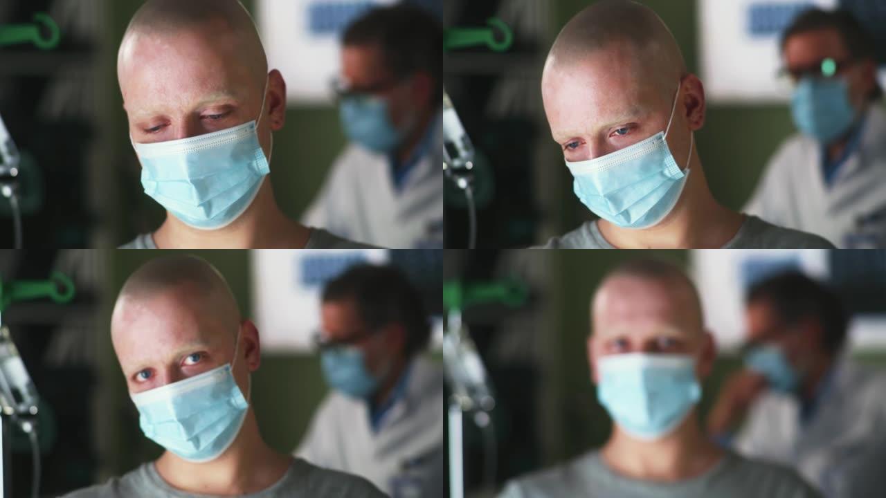 在诊所预约期间戴口罩的不快乐癌症患者