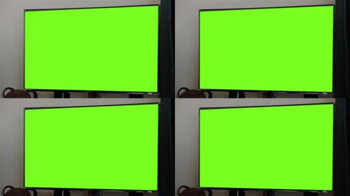 带绿色色度键屏幕的发光二极管屏幕电视。