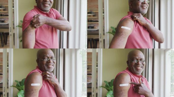 非裔美国高级男子的肖像在家里展示了他接种疫苗的肩膀