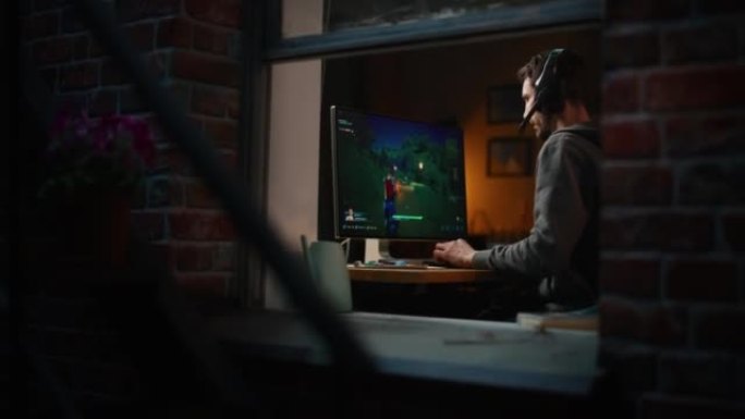 在家玩游戏: 玩家流媒体和在计算机上玩在线视频游戏。享受3D射击游戏的时尚男性玩家。屏幕显示街机在线