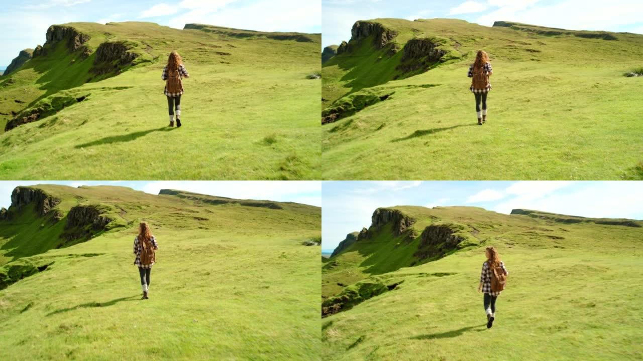 一名年轻女子在山上徒步旅行的4k视频片段