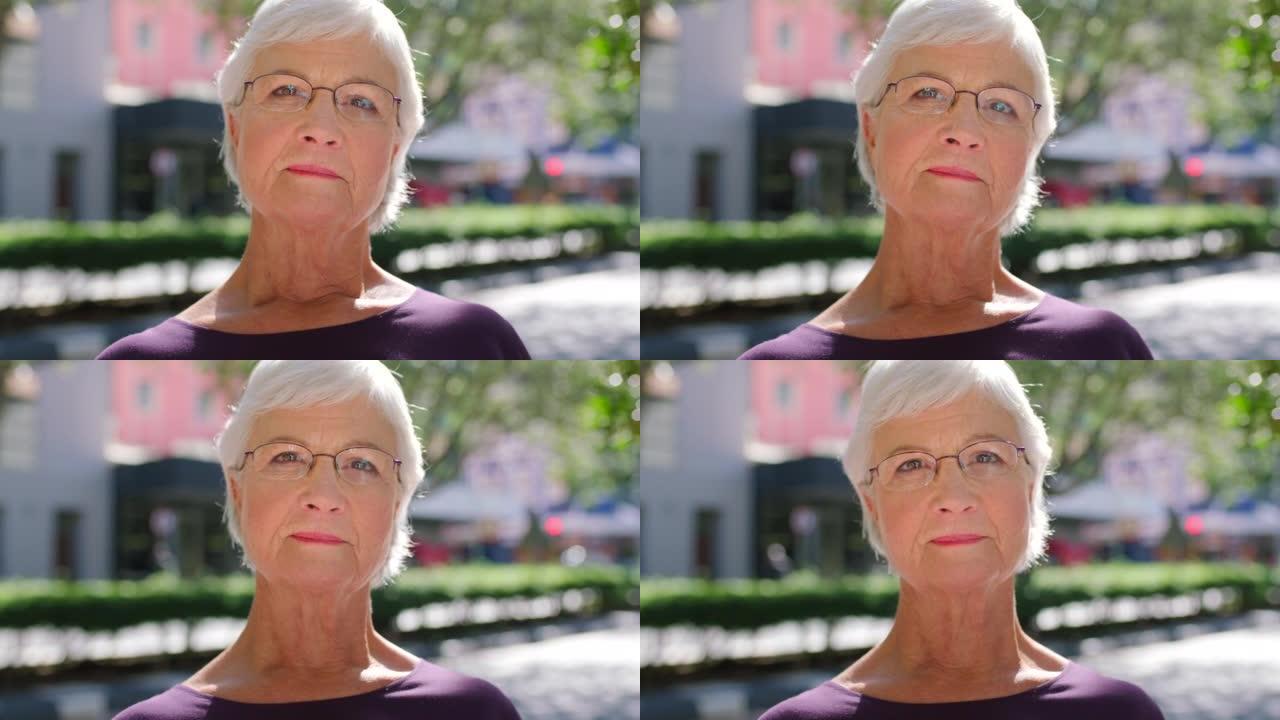 外面戴着眼镜的严肃的老妇人。灰发女性的肖像，脸上带着脾气暴躁和怀疑的表情。一个不赞成和不满意的保守派