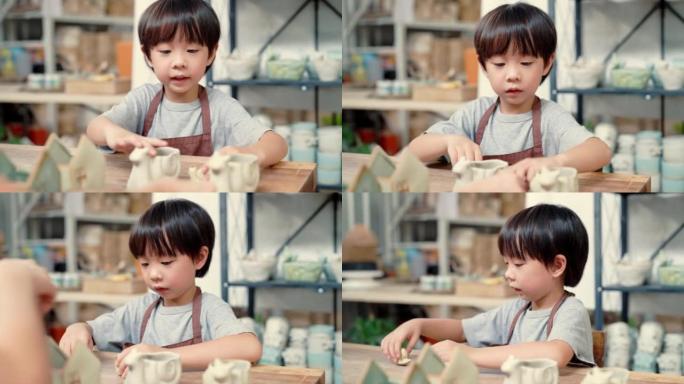 年轻的陶瓷店老板带着儿子看产品。