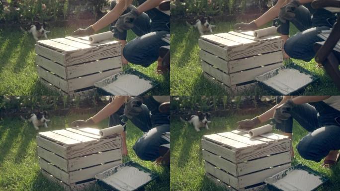 在花园里DIY。板条箱改造项目-油漆