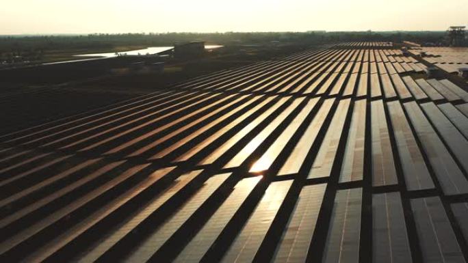 日出时的电力能源太阳能农场