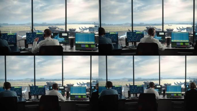 多元化的空中交通管制团队在现代化的机场塔中工作。办公室里满是台式电脑显示屏，配有导航屏幕、飞机起飞和