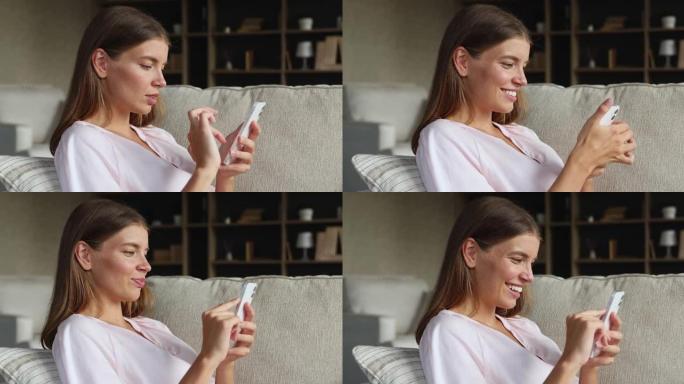 现代智能手机的青少年女性满意用户侧视图