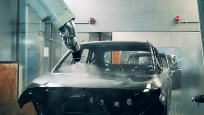 机器人画一辆车。汽车生产线