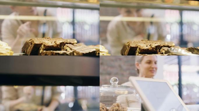 一个成熟女人在面包店选择零食的4k视频片段