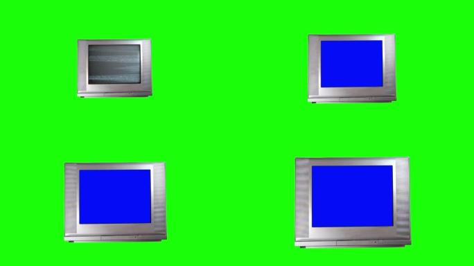 绿色背景上带有绿色屏幕的复古电视。放大。