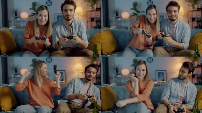 幸福的夫妇在发光的房子里享受视频游戏和一起大笑的肖像