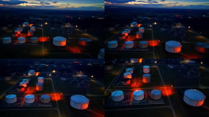 空中无人机视点天然气精炼厂在夜间照明