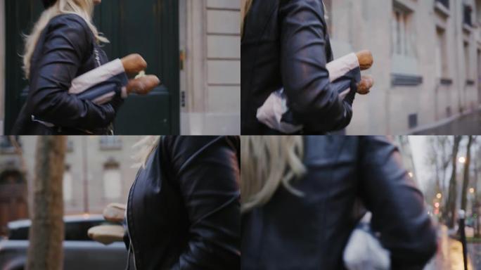 SLO MO迷人的法国女人在巴黎的街道上背着法式长棍面包