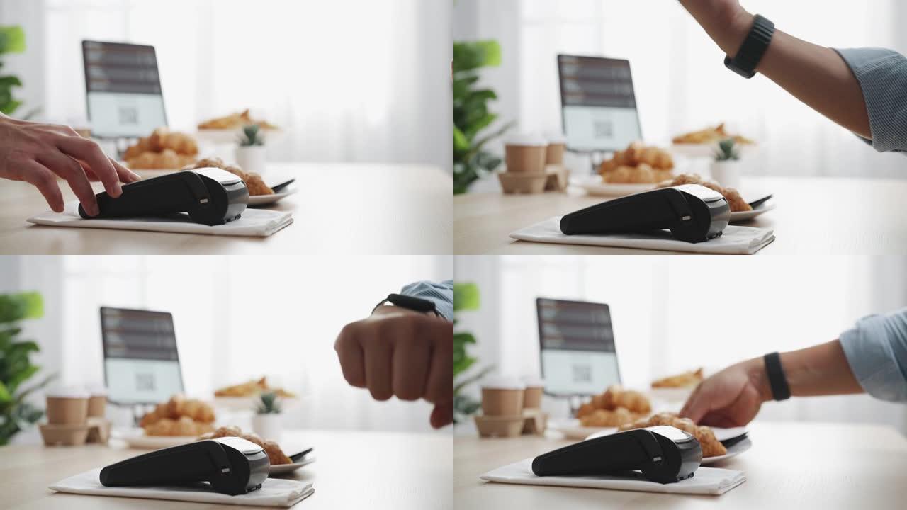 客户在刷卡机上使用智能手表支付非接触式NFC