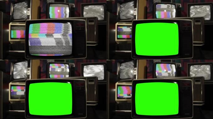 复古电视在许多具有静态噪声和测试图案信号的老式电视中打开色度键绿色屏幕。特写。