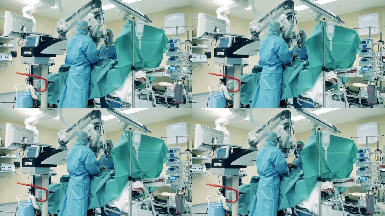 外科医生在手术过程中使用显微装置