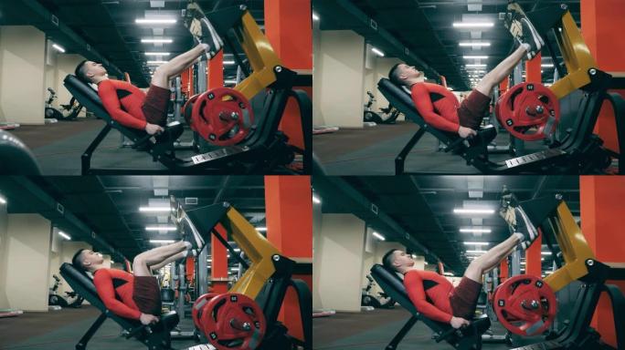 运动员正在使用健身器来保持双腿健康