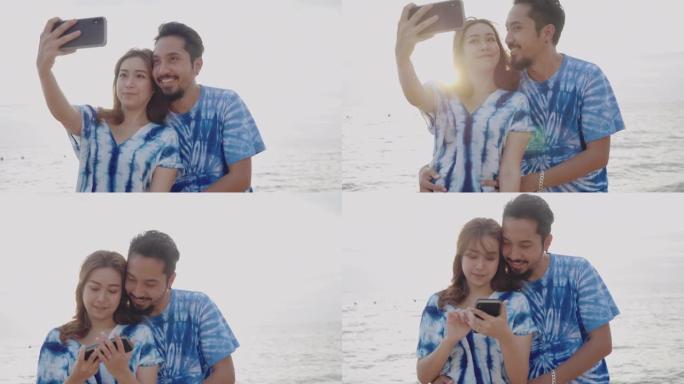 亚洲夫妇感到快乐，用相机自拍。