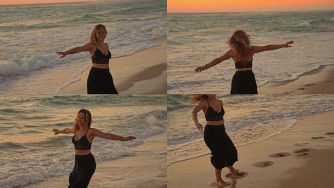 SLO MO年轻女子在沙滩上跳舞很开心