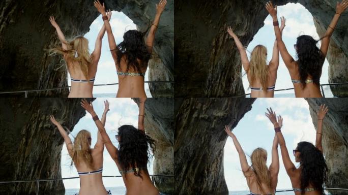 4k视频片段，两名无法识别的妇女一起坐在船上，在意大利享受假期