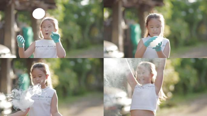 快乐的小女孩玩肥皂泡