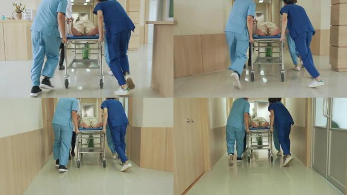 医务人员将医院走廊中的紧急患者转移到急诊室的后视图