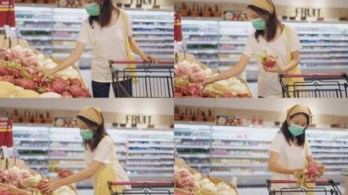 在超市戴保护口罩的女人。