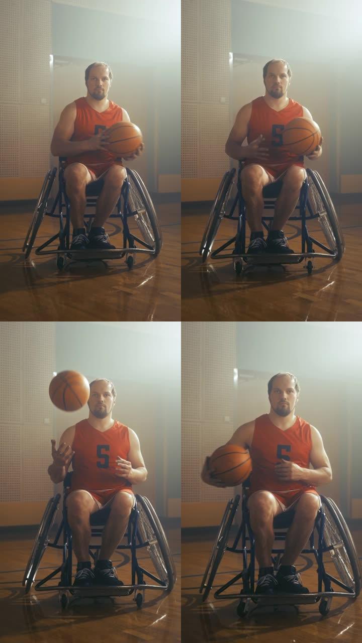 垂直视频。英俊的轮椅篮球运动员的肖像穿着红色的衬衫运球，看着相机，微笑着。坚定，有动力的残障人士赢得