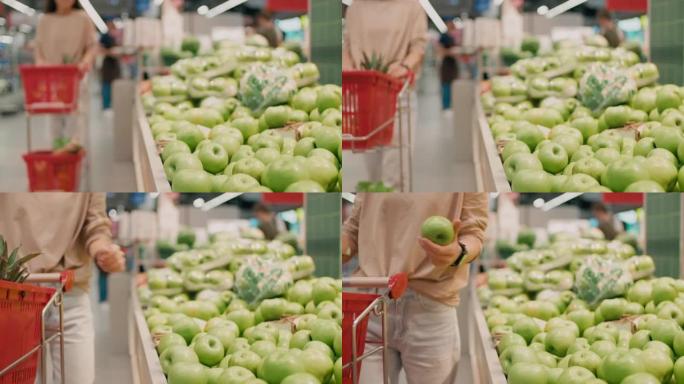 在杂货店购买新鲜苹果