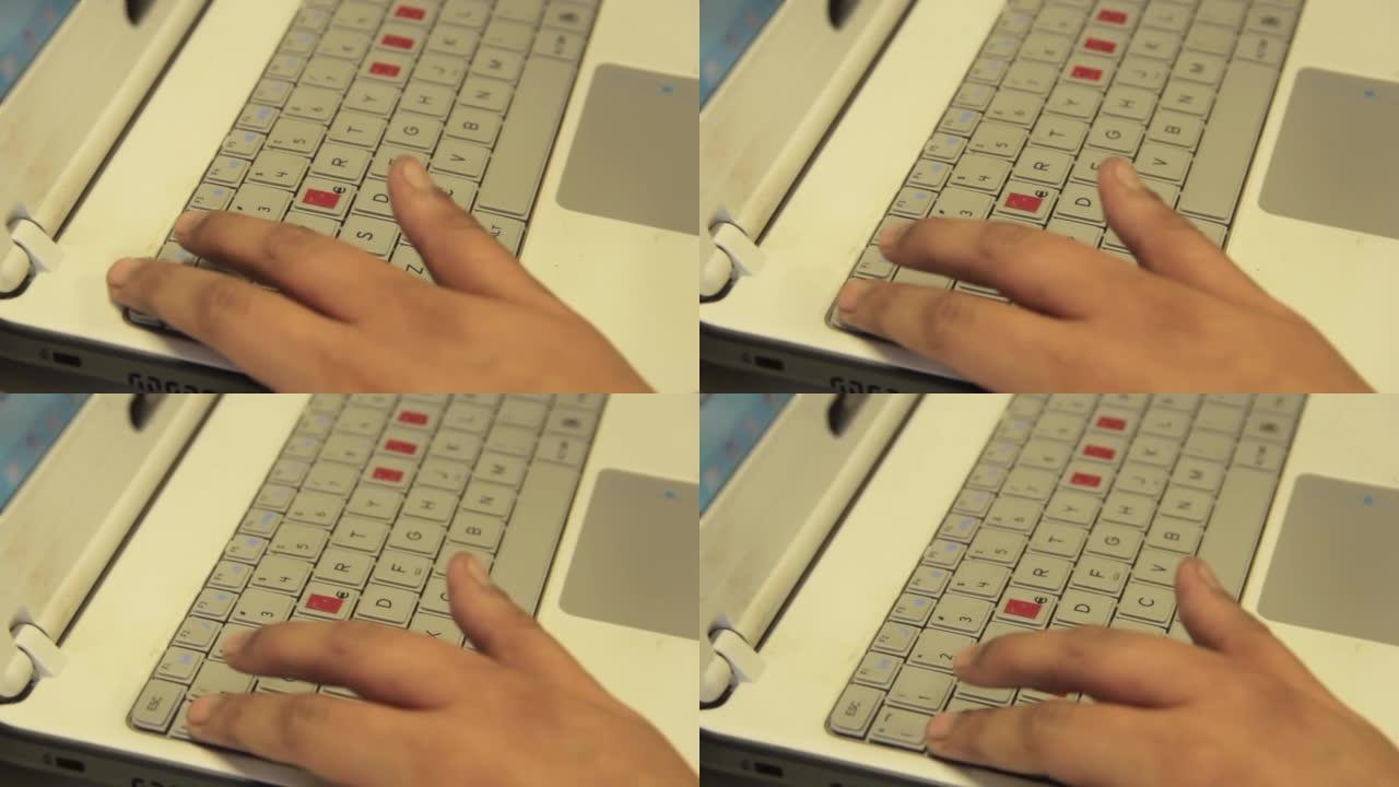盲人或视障学生的手在盲人学校的课堂上学习使用计算机。