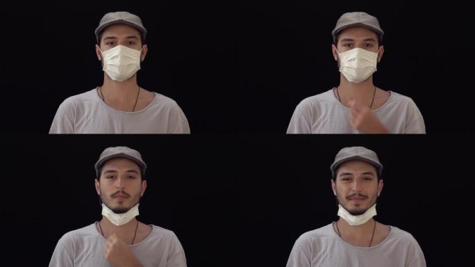 年轻的成年男子戴着污染面具，以保护自己免受病毒侵害。4k视频