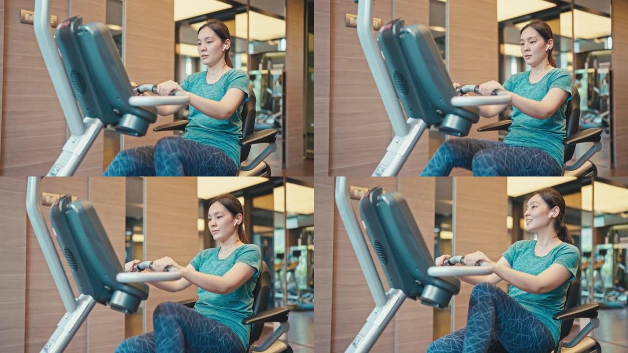 体育女性在健身房锻炼