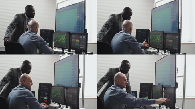 两名男子在经纪公司共同工作