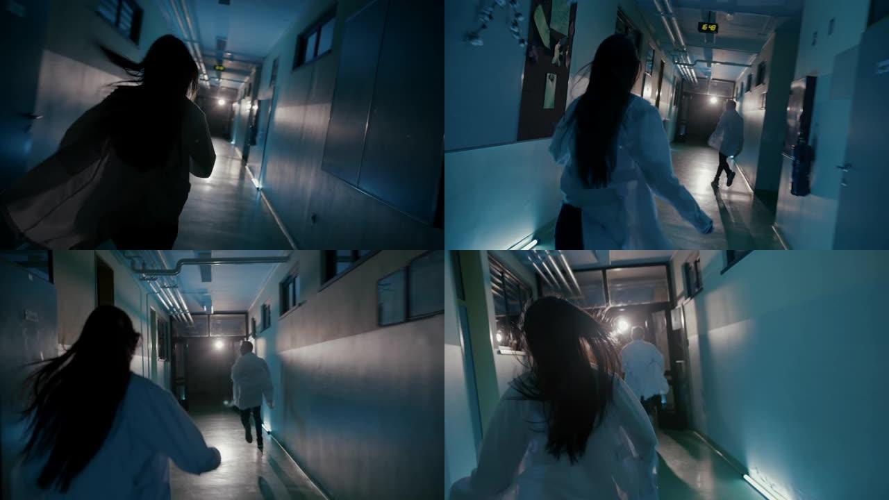 SLO MO两名身穿实验室外套的医生在医院走廊上奔跑