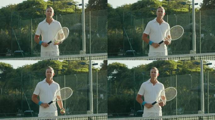 成熟的网球运动员在网球场上在球拍上弹跳球