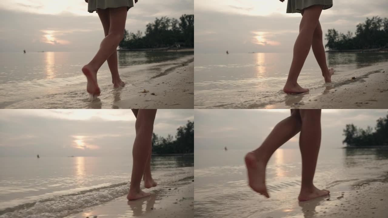 日落时的海滩漫步沙滩漫步脚