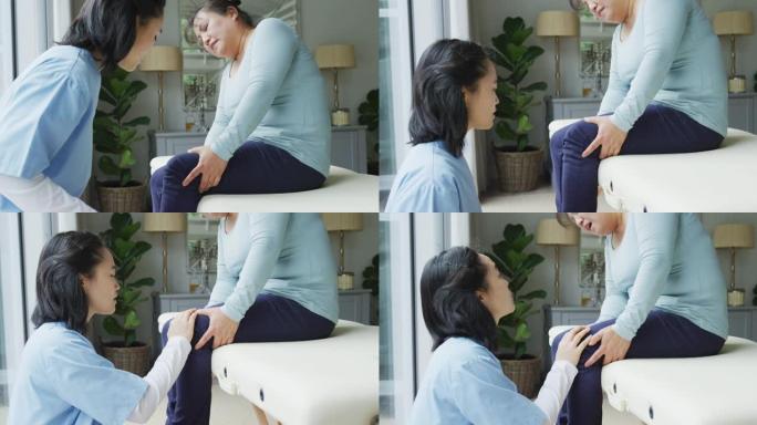 亚洲女性理疗师检查女性患者在手术中膝盖疼痛