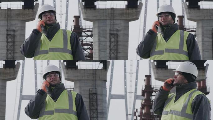 男工程师检查桥梁并在手机上讲话